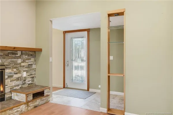 a view of livingroom with hardwood floor and hallway