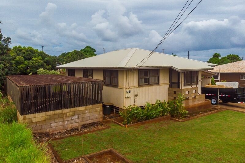4770 Moi Road Hanapepe, HI 96716 - Photo 3 of 11 a house with garden in front of it