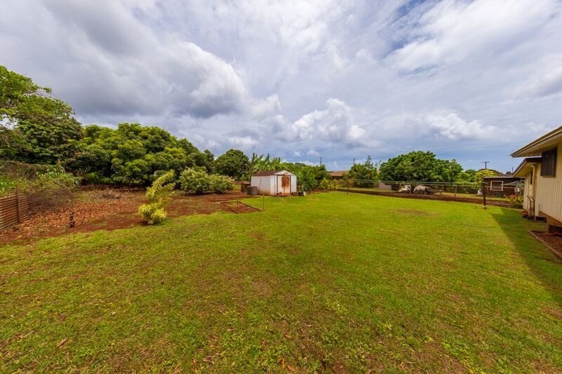 4770 Moi Road Hanapepe, HI 96716 - Photo 4 of 11 a view of swimming pool and lake in the background