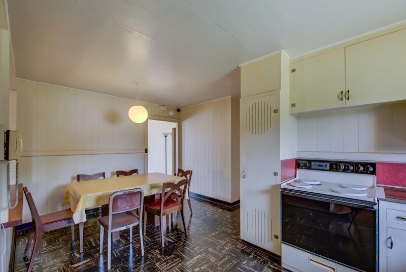 4770 Moi Road Hanapepe, HI 96716 - Photo 6 of 11 a view of a dining room with furniture and wooden floor