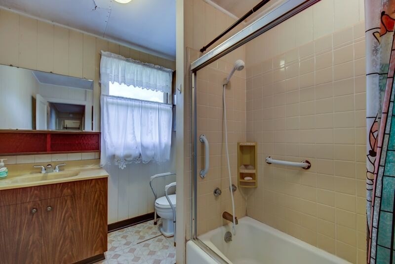4770 Moi Road Hanapepe, HI 96716 - Photo 9 of 11 a bathroom with a sink a toilet and shower