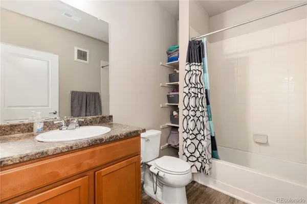 a view of a hallway with washer and dryer