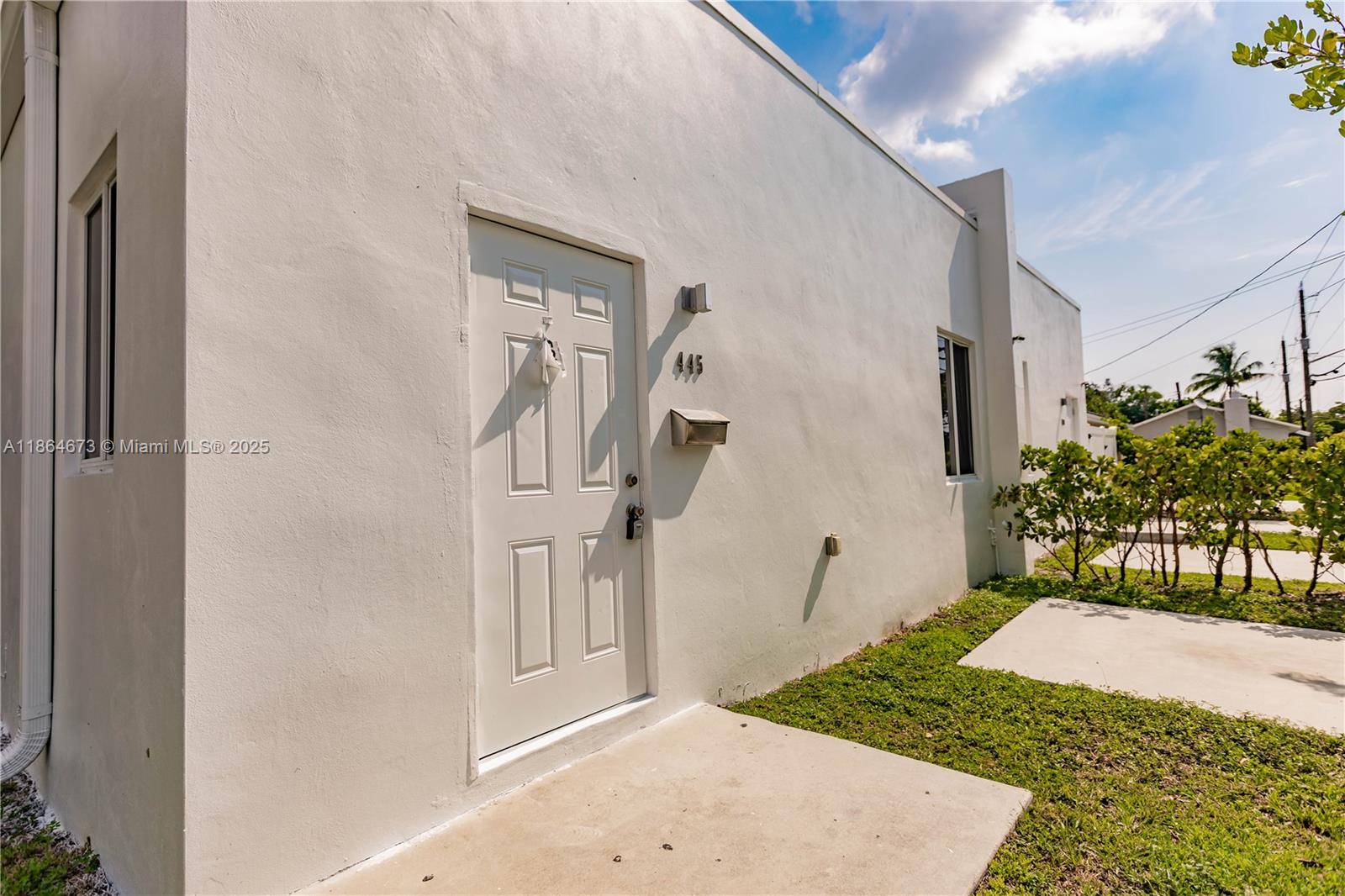 445 Northwest 77th Street, Unit 445 Miami, FL 33150 - Photo 3 of 20 a view of entryway