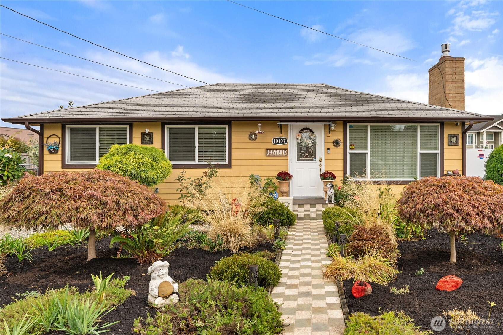 10107 Meridian Avenue Everett, WA 98208 - Photo 1 of 26 front view of a house with a yard