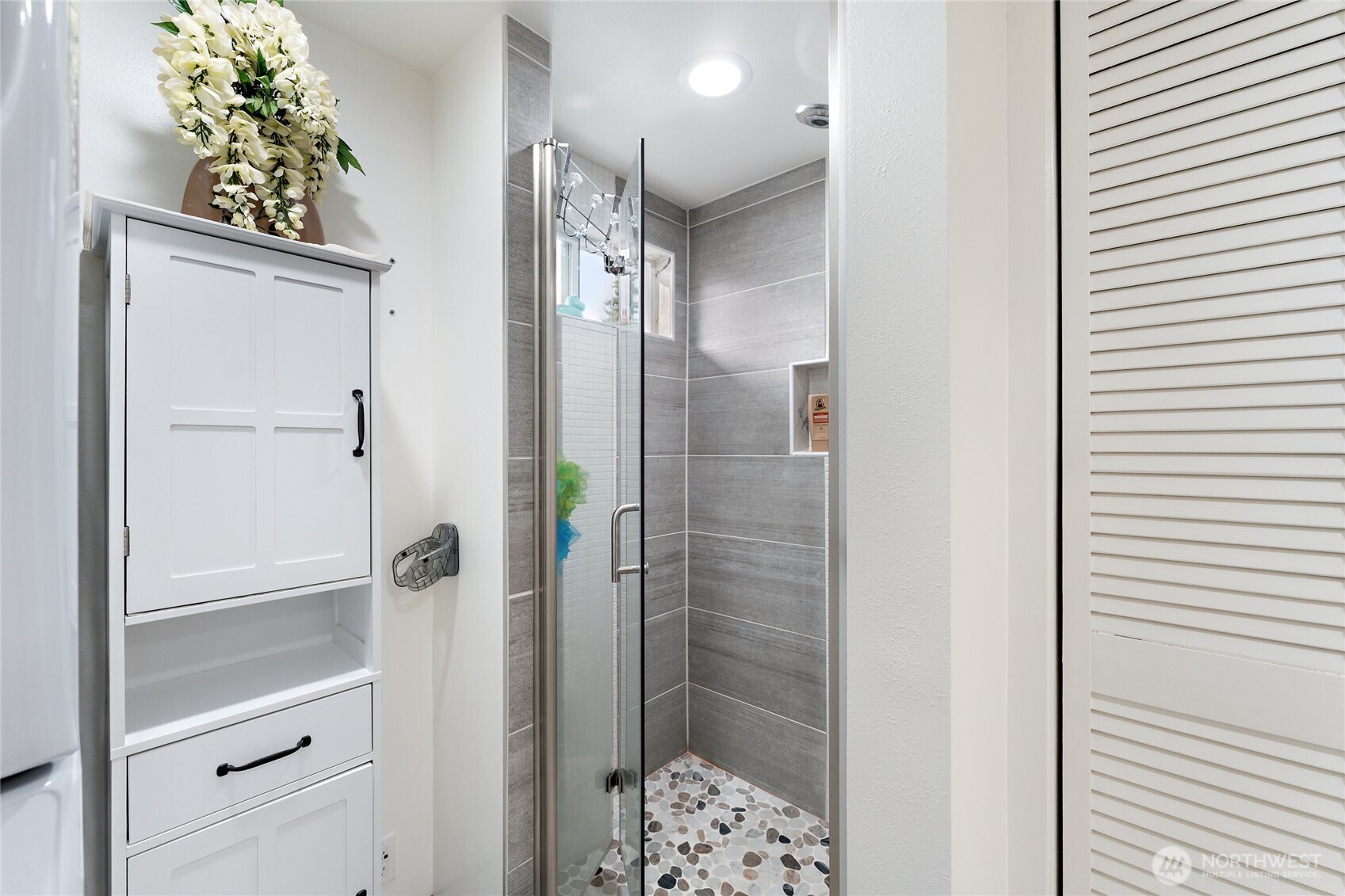 10107 Meridian Avenue Everett, WA 98208 - Photo 11 of 26 a bathroom with a shower and a sink