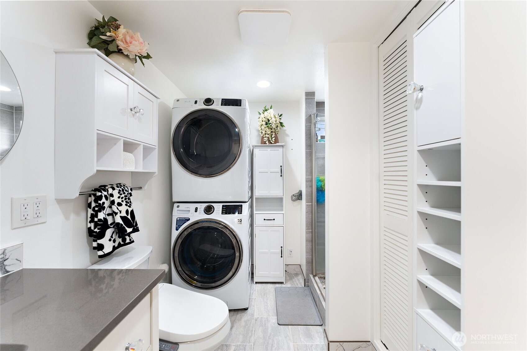 10107 Meridian Avenue Everett, WA 98208 - Photo 12 of 26 a view of a hallway with washer and dryer