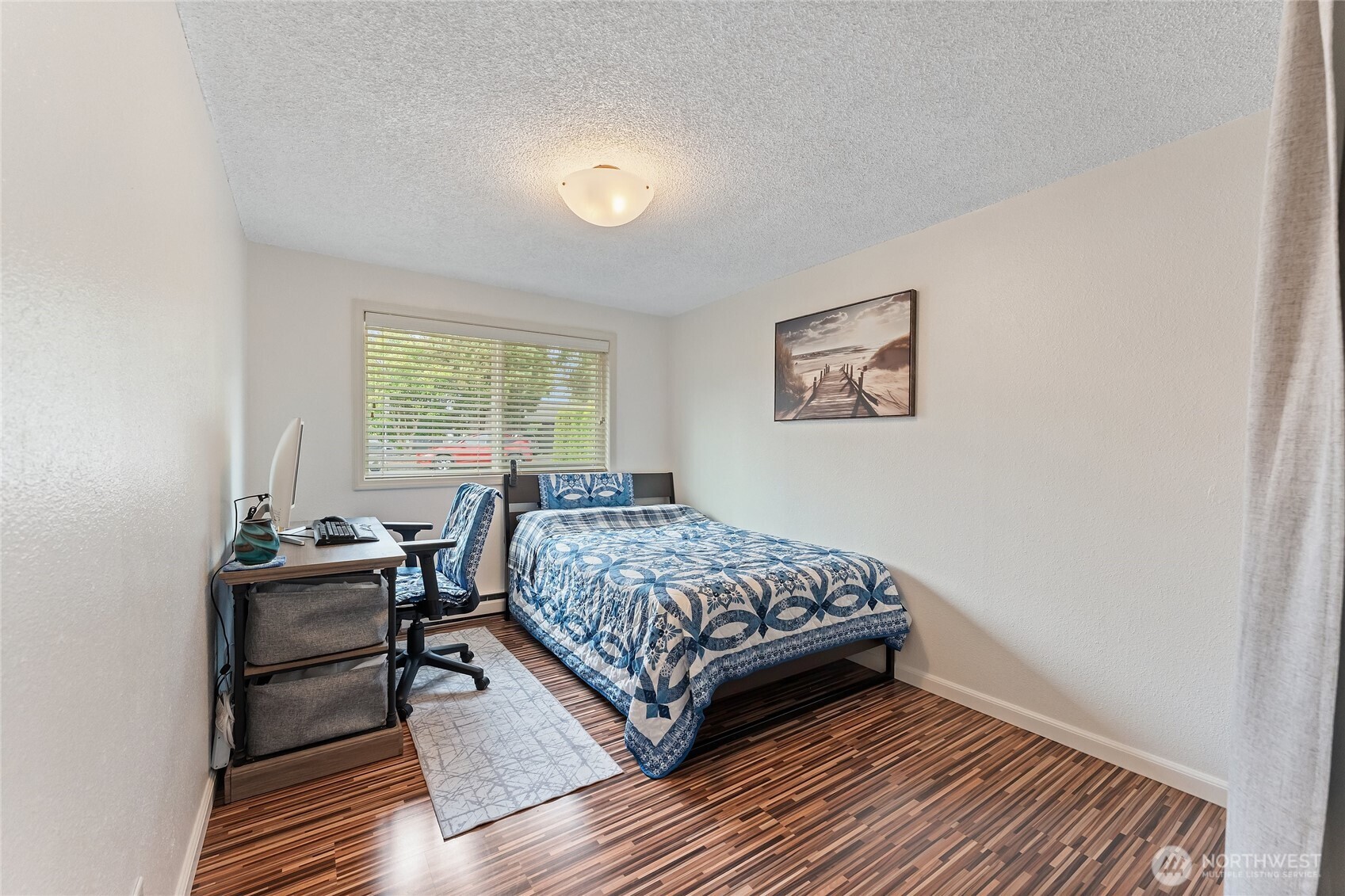 10107 Meridian Avenue Everett, WA 98208 - Photo 14 of 26 a bedroom with a bed and a window