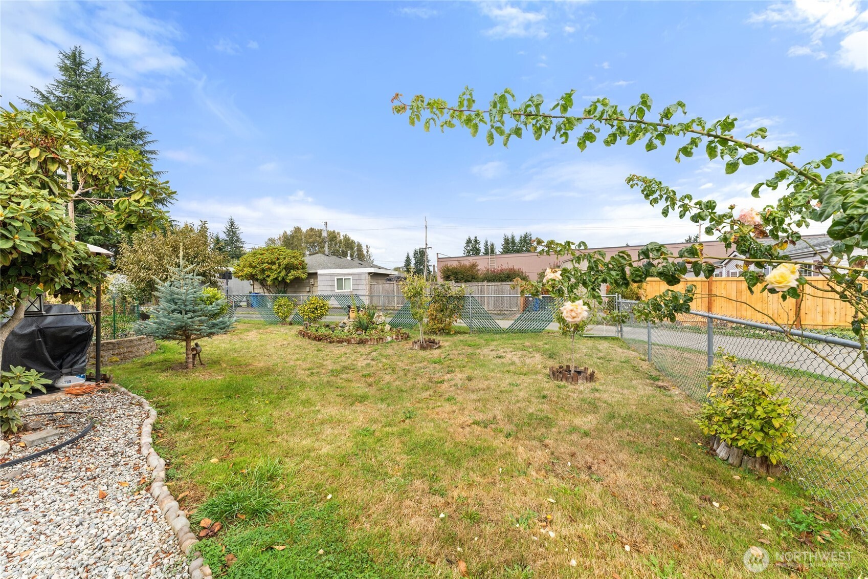 10107 Meridian Avenue Everett, WA 98208 - Photo 21 of 26 a view of a yard with an outdoor seating
