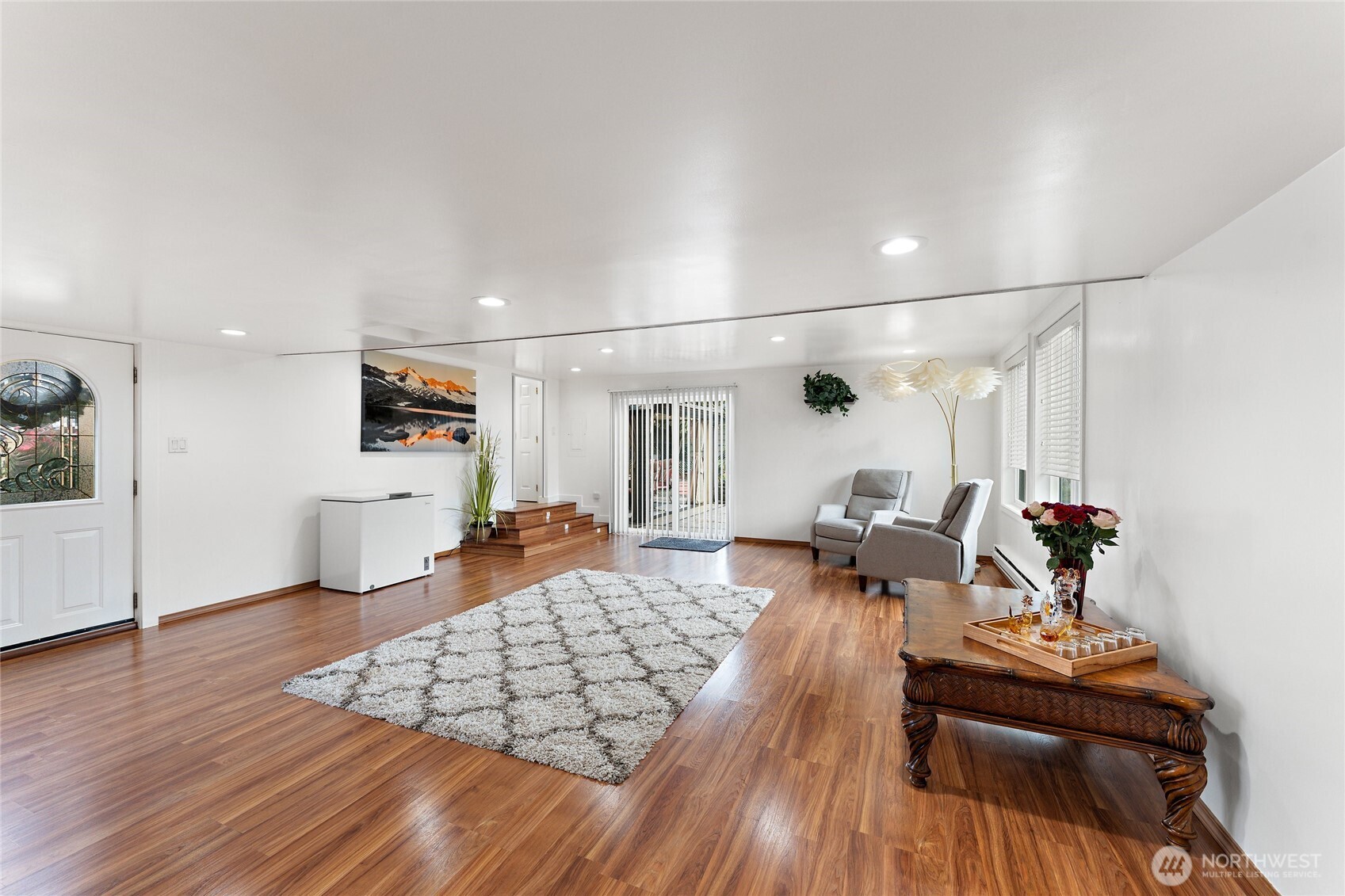 10107 Meridian Avenue Everett, WA 98208 - Photo 9 of 26 a living room with furniture and wooden floor