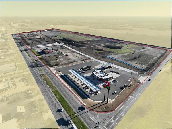 an aerial view of beach and ocean