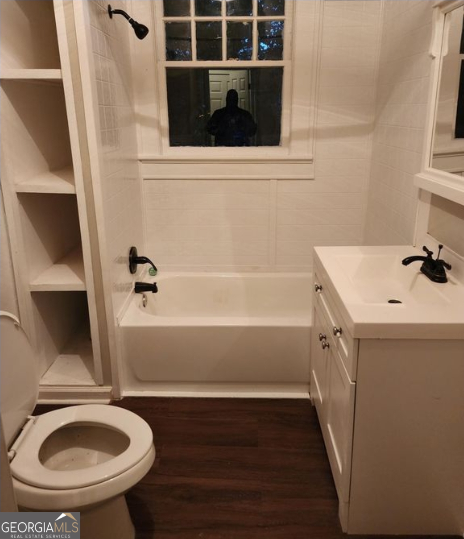 919 Inverness Avenue Macon, GA 31204 - Photo 7 of 9 a bathroom with a sink and a toilet