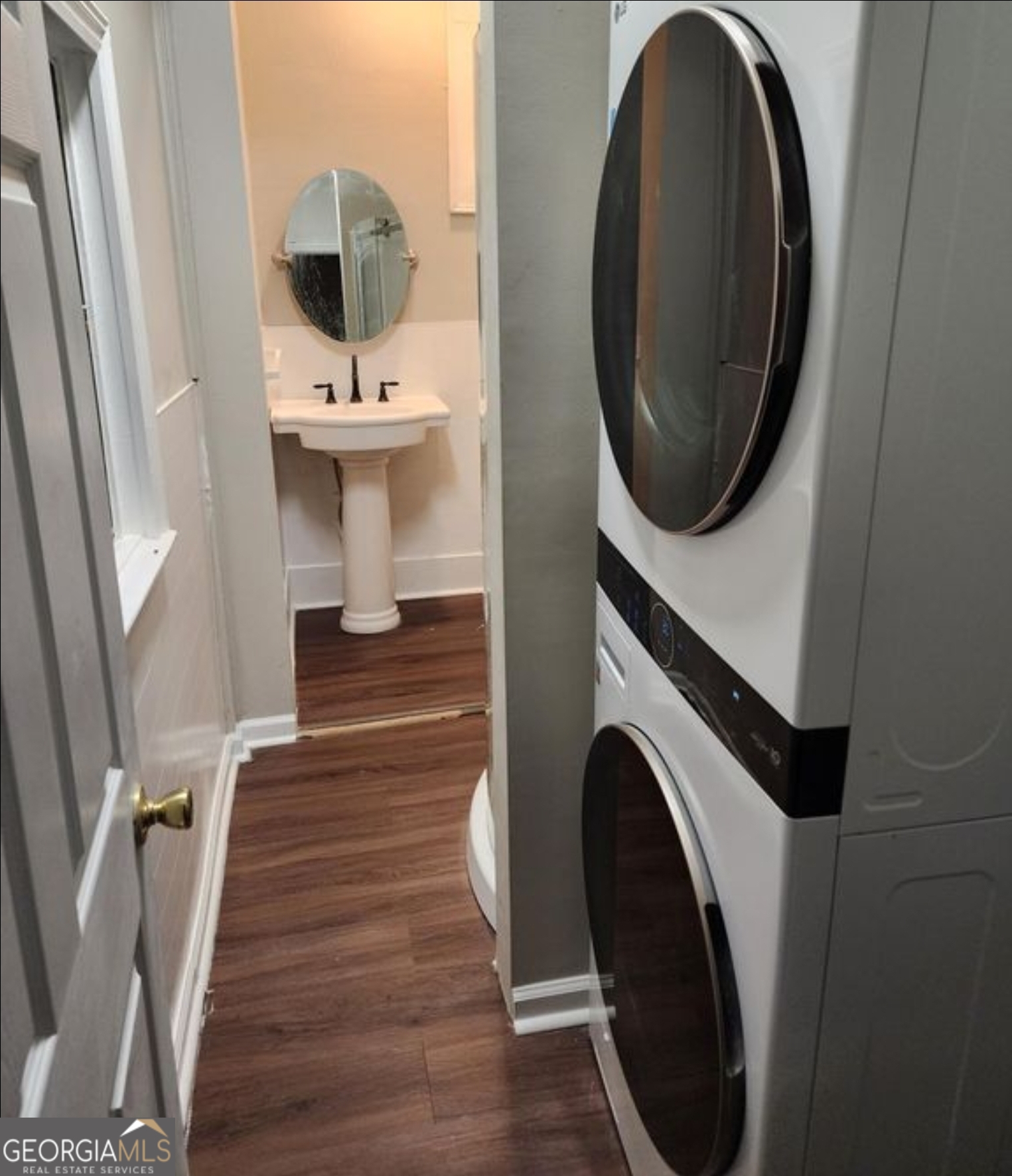 919 Inverness Avenue Macon, GA 31204 - Photo 8 of 9 a view of a hallway with washer and dryer