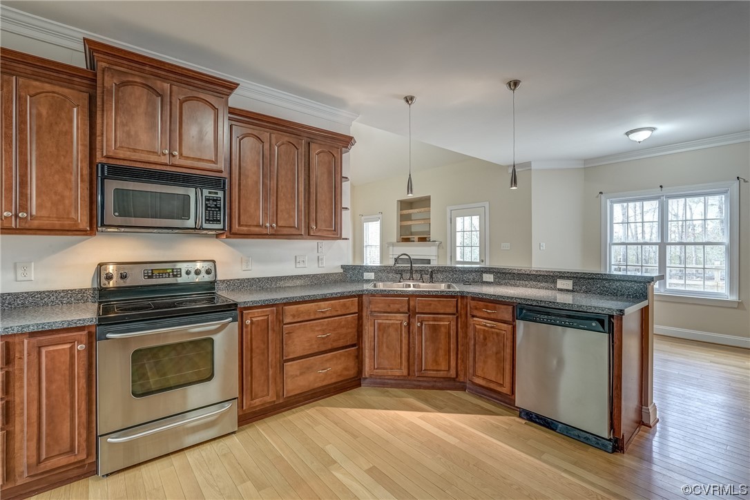 13220 2nd Branch Road Chesterfield, VA 23838 - Photo 15 of 50 a kitchen with granite countertop wooden cabinets stainless steel appliances and a sink