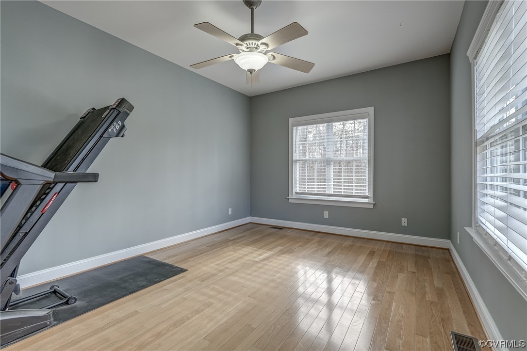 13220 2nd Branch Road Chesterfield, VA 23838 - Photo 20 of 50 wooden floor in an empty room with a window