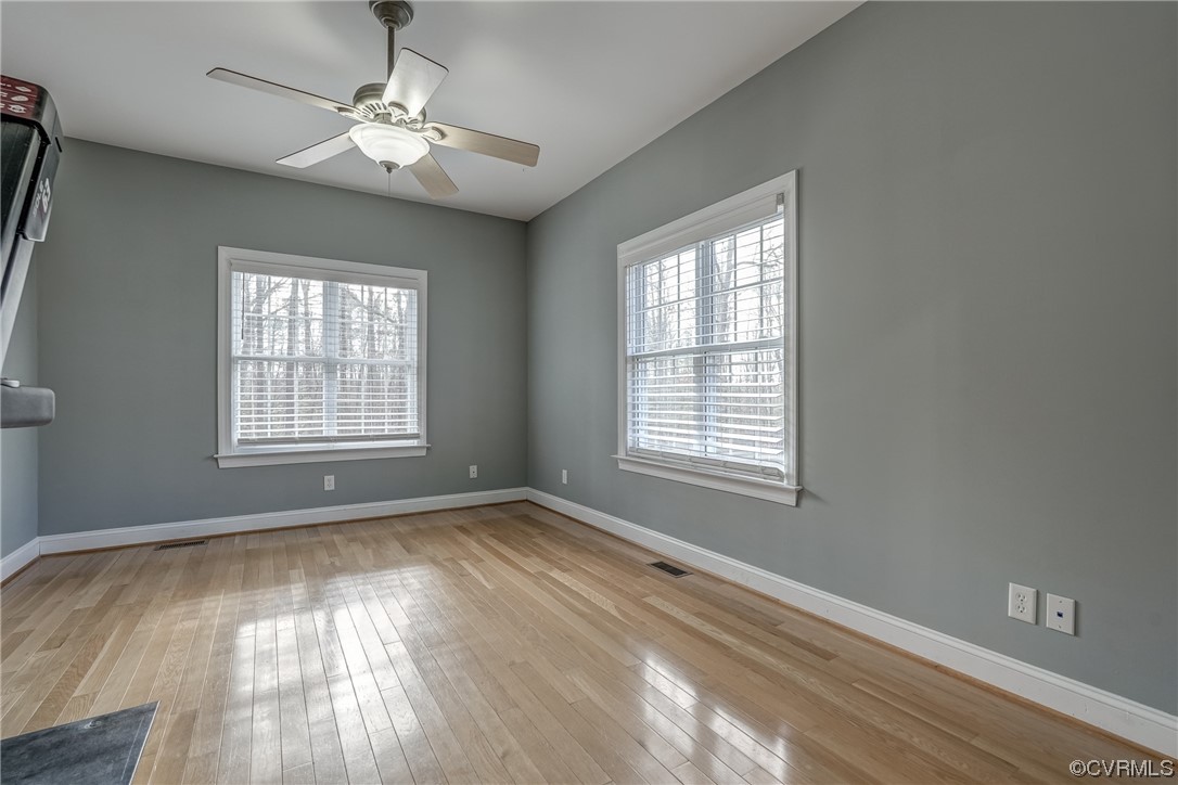 13220 2nd Branch Road Chesterfield, VA 23838 - Photo 21 of 50 a view of an empty room with wooden floor and a window