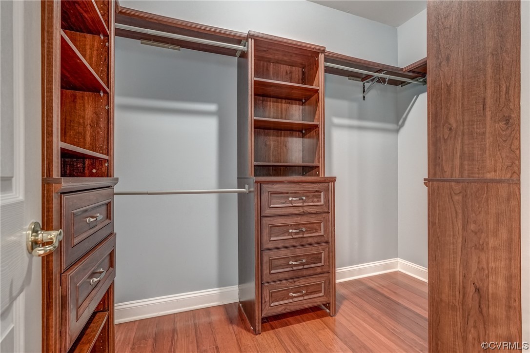 13220 2nd Branch Road Chesterfield, VA 23838 - Photo 26 of 50 a view of walk in closet with clothes and shoes