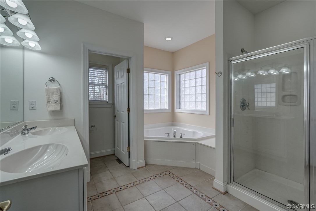 13220 2nd Branch Road Chesterfield, VA 23838 - Photo 27 of 50 a bathroom with a granite countertop sink a mirror and a bathtub