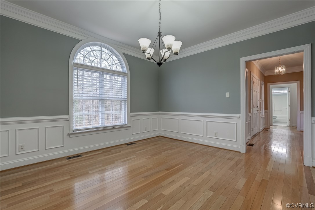 13220 2nd Branch Road Chesterfield, VA 23838 - Photo 7 of 50 wooden floor in an empty room with a window