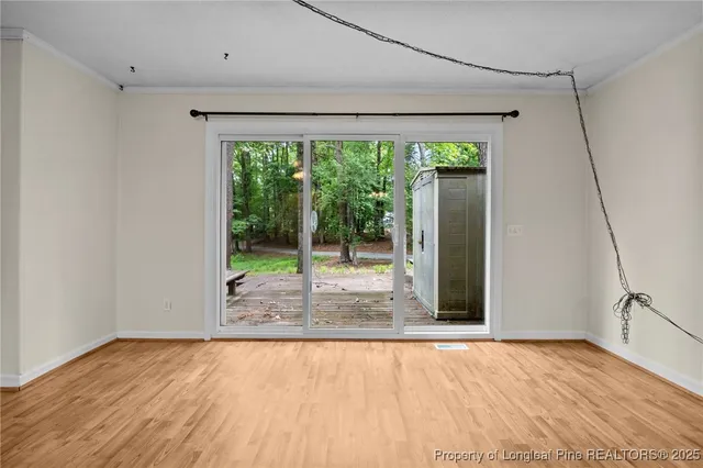 a view of a room with a large window