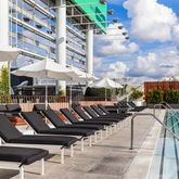 a view of a patio with chairs and a table