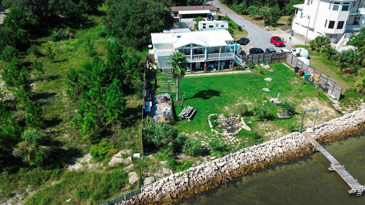 1907 Blankenship Road Navarre, FL 32566 - Photo 11 of 32 an aerial view of a house with a yard basket ball court and outdoor seating