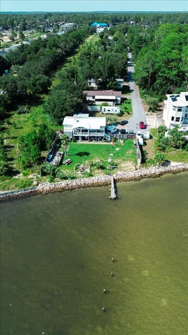 a view of a lake with a yard