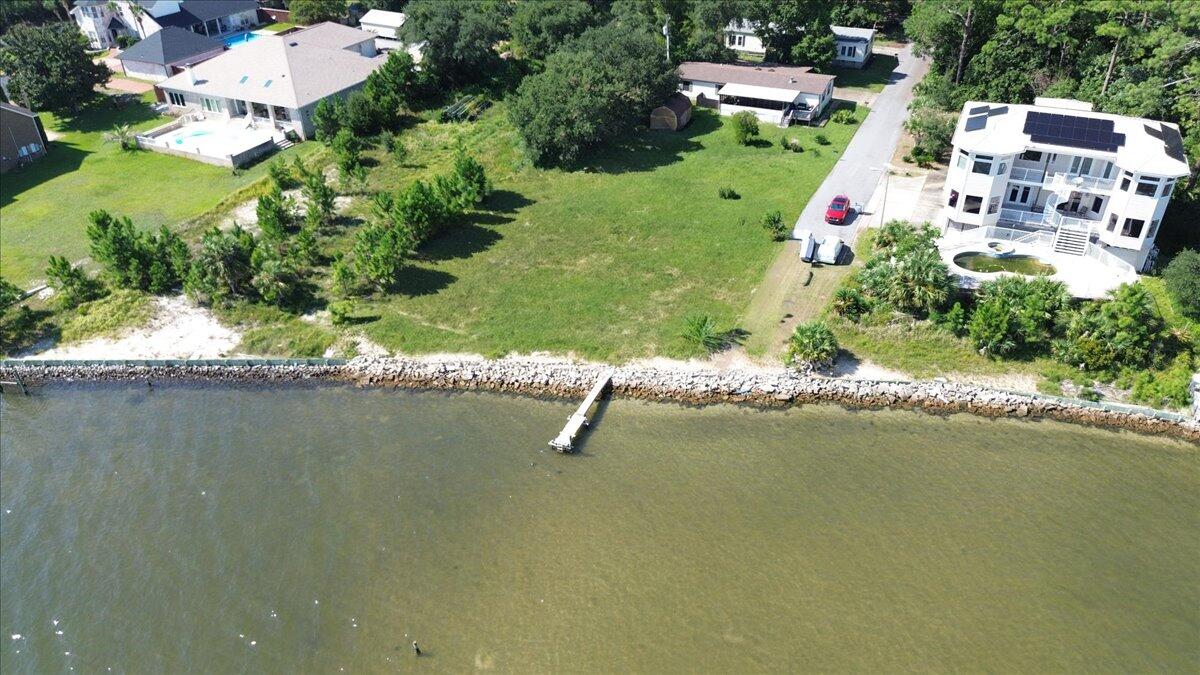 1907 Blankenship Road Navarre, FL 32566 - Photo 29 of 32 an aerial view of residential houses with outdoor space and lake view