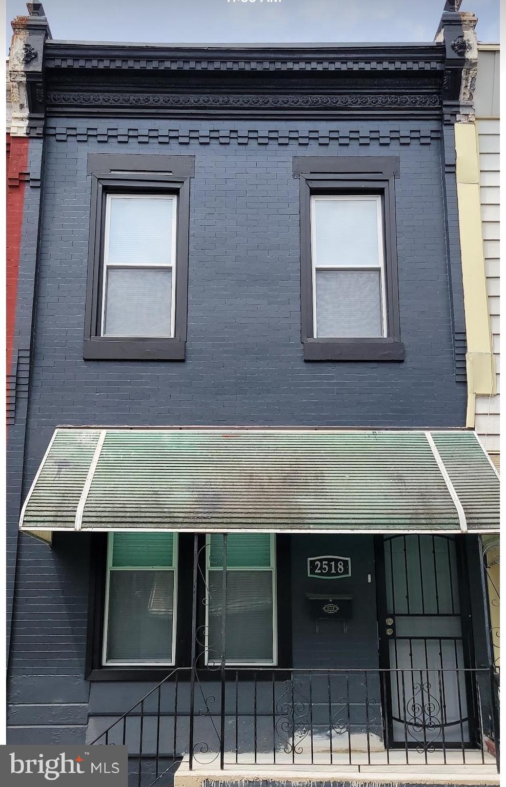2518 North Cleveland Street Philadelphia, PA 19132 - Photo 1 of 2 a front view of a house with stairs
