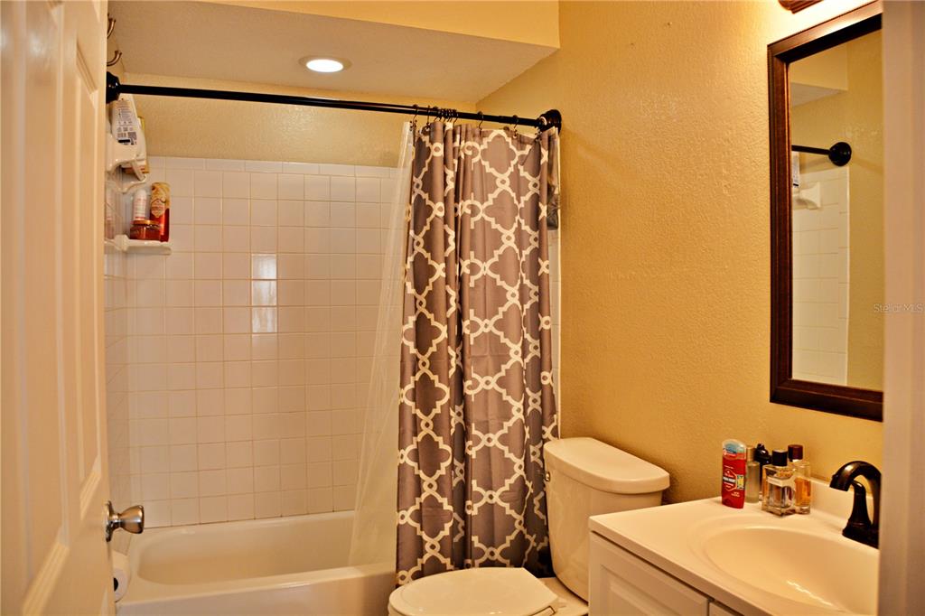 5528 Cherry Road Lakeland, FL 33810 - Photo 21 of 47 a bathroom with a sink and a shower
