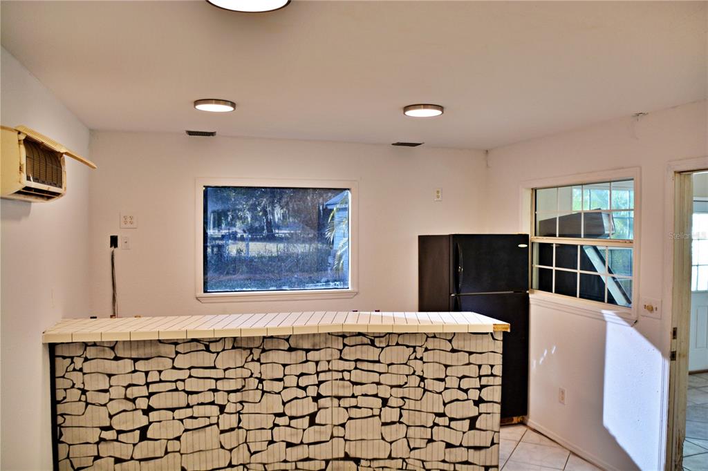 5528 Cherry Road Lakeland, FL 33810 - Photo 26 of 47 a bathroom with a bathtub and a shower