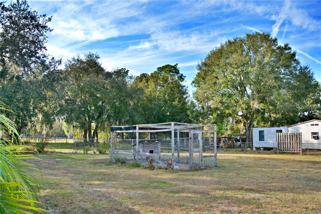 5528 Cherry Road Lakeland, FL 33810 - Photo 35 of 47 a front view of a house with a yard