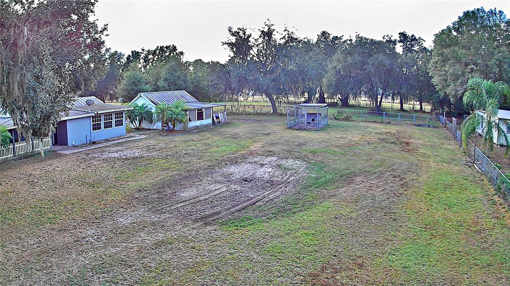 5528 Cherry Road Lakeland, FL 33810 - Photo 37 of 47 a view of outdoor space with garden and trees