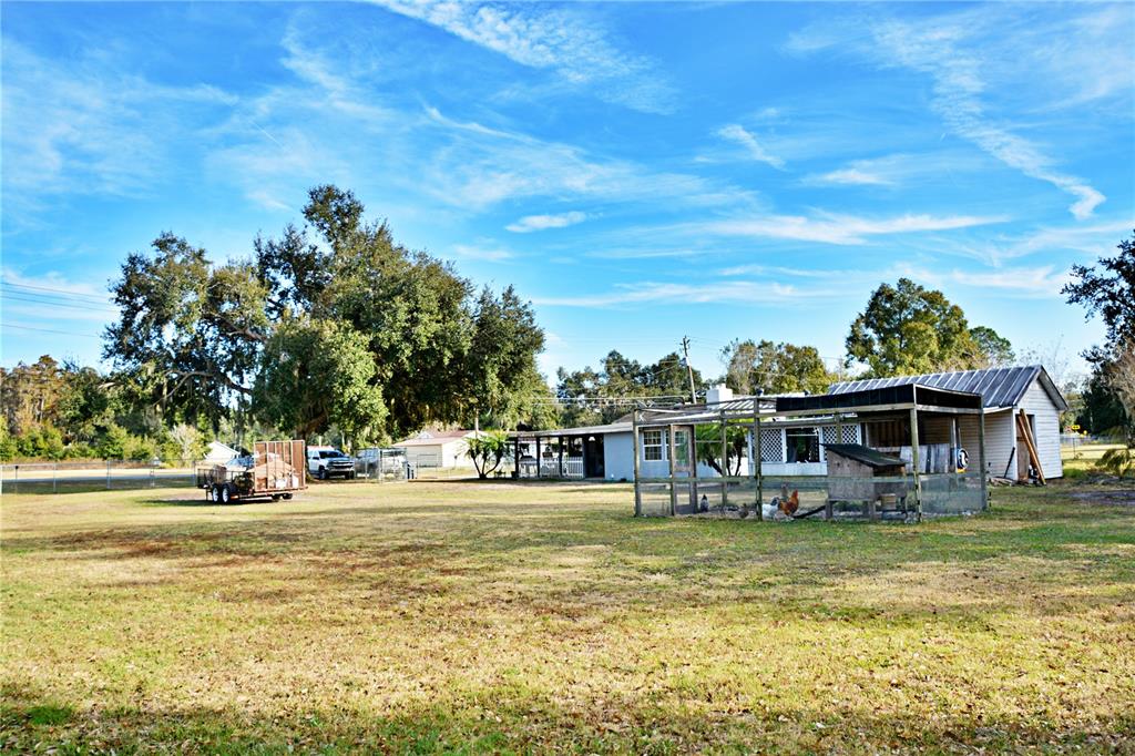 5528 Cherry Road Lakeland, FL 33810 - Photo 42 of 47 a view of a house with a yard