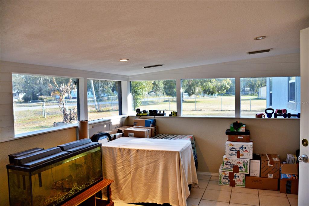 5528 Cherry Road Lakeland, FL 33810 - Photo 10 of 47 a living room with large windows