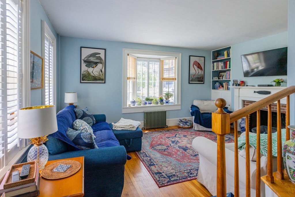 27 Maverick Street Marblehead, MA 01945 - Photo 21 of 31 a living room with furniture and a flat screen tv