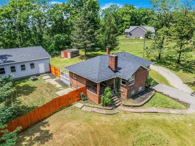 swimming pool view with a seating space