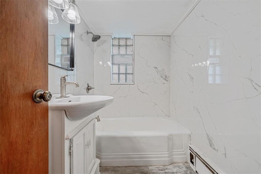 104 Linden Road Canonsburg, PA 15317 - Photo 24 of 48 a bathroom with a bathtub sink vanity and mirror