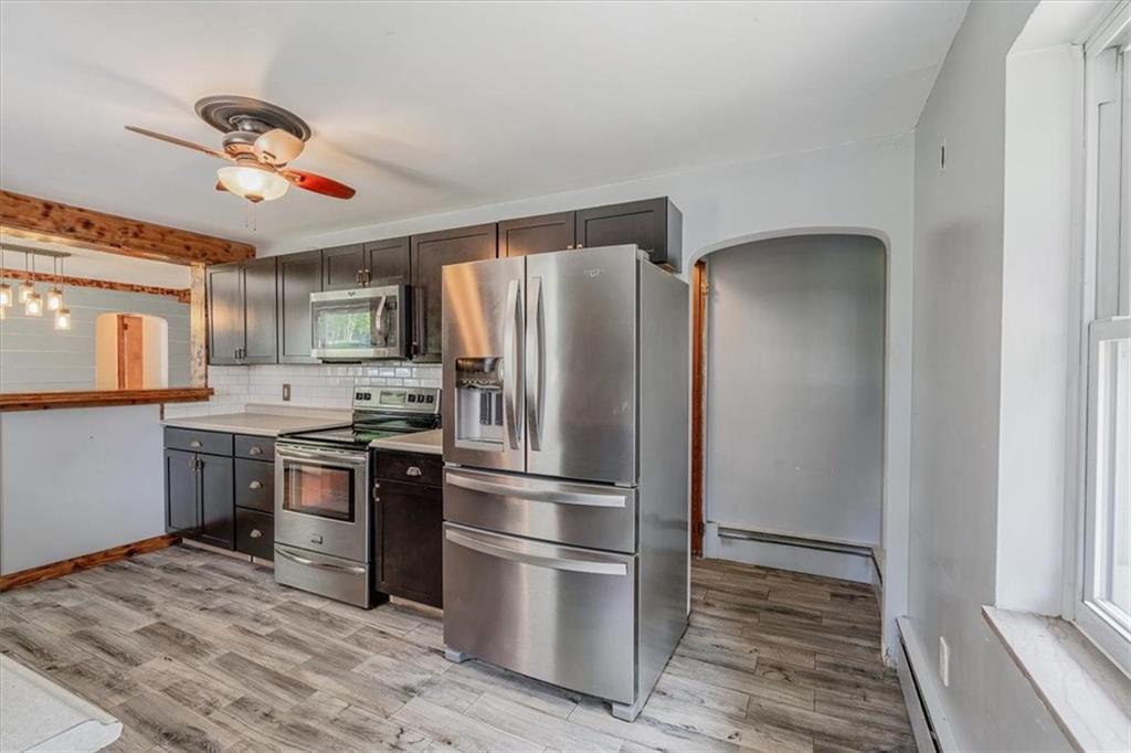 104 Linden Road Canonsburg, PA 15317 - Photo 8 of 48 a kitchen with stainless steel appliances granite countertop a refrigerator and a stove top oven