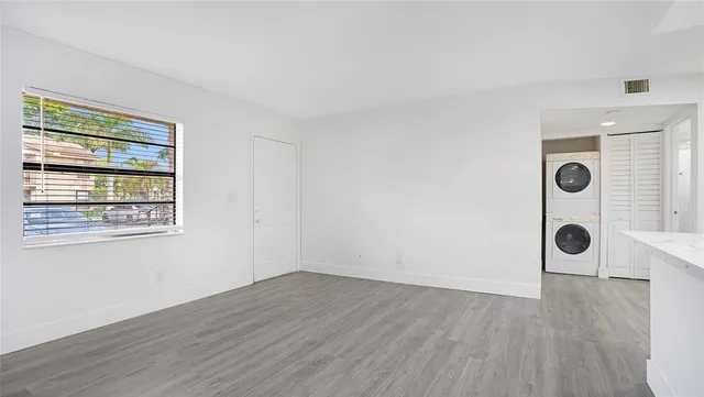a bathroom with a sink toilet and a mirror
