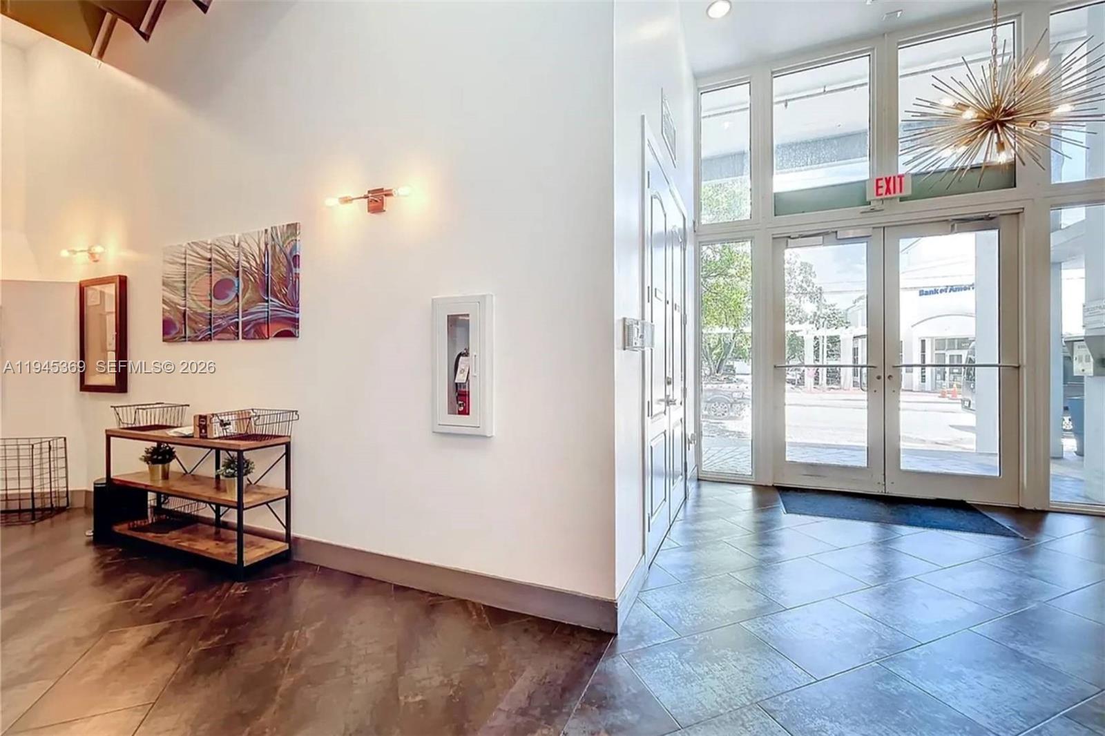 3250 Grand Avenue, Unit 306 Miami, FL 33133 - Photo 2 of 32 a view of livingroom with hardwood and furniture