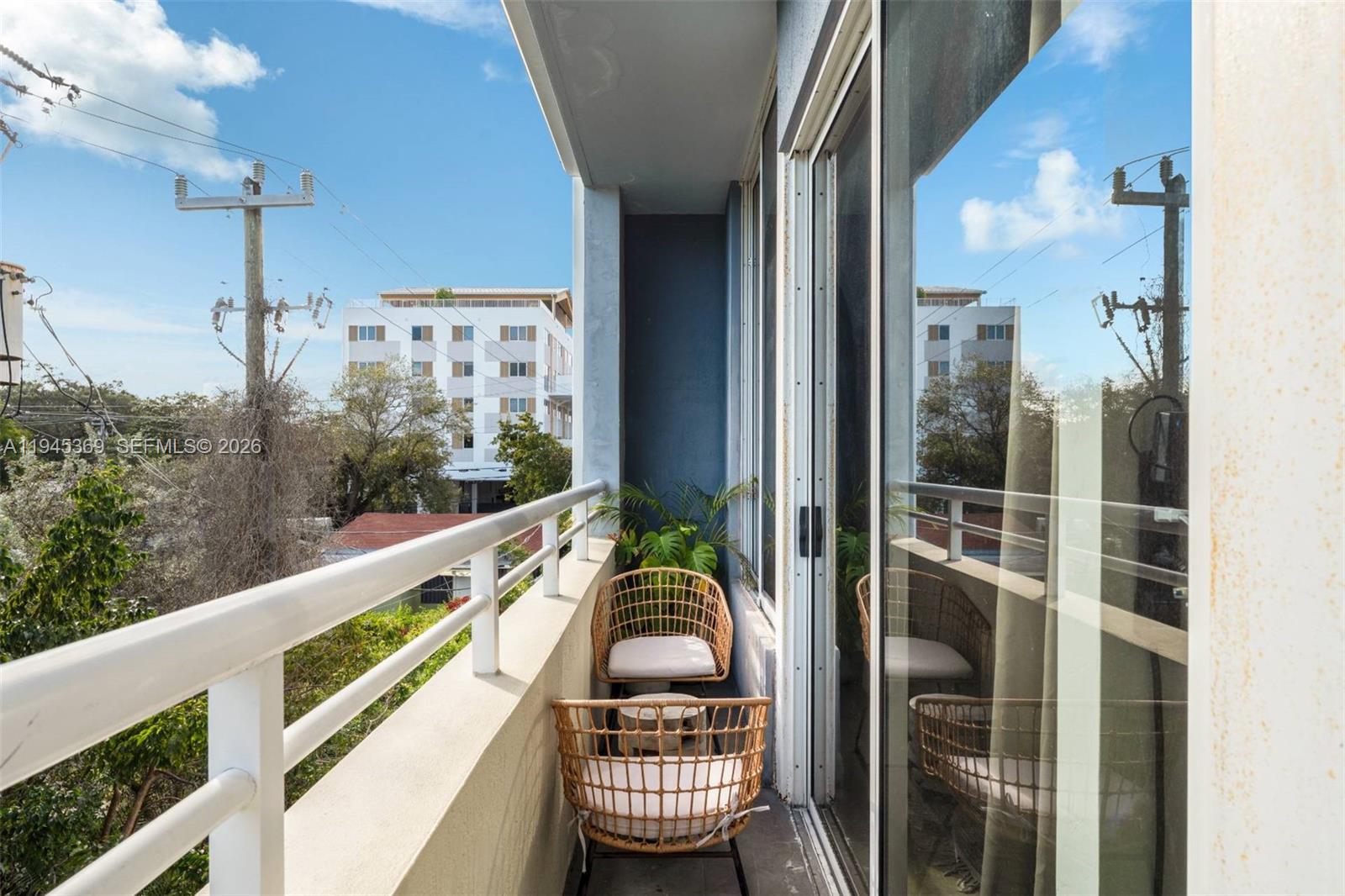 3250 Grand Avenue, Unit 306 Miami, FL 33133 - Photo 28 of 32 a view of a balcony with furniture