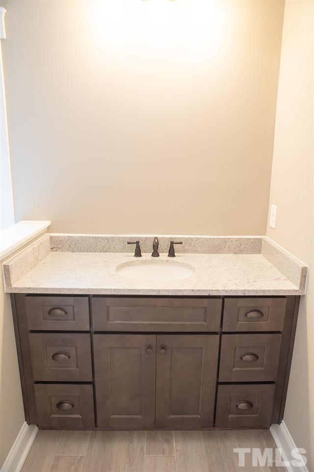 1426 Bowmantown Road Roxboro, NC 27574 - Photo 17 of 28 a view of room with cabinets