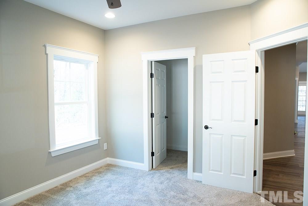 1426 Bowmantown Road Roxboro, NC 27574 - Photo 20 of 28 a view of an empty room and window