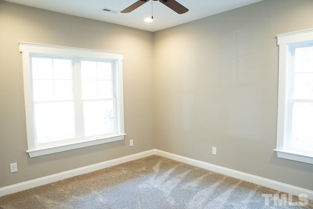 1426 Bowmantown Road Roxboro, NC 27574 - Photo 21 of 28 an empty room with a window