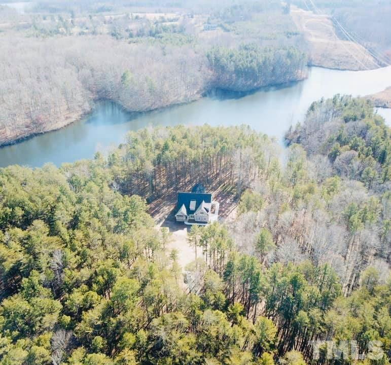 1426 Bowmantown Road Roxboro, NC 27574 - Photo 4 of 28 a view of a lake