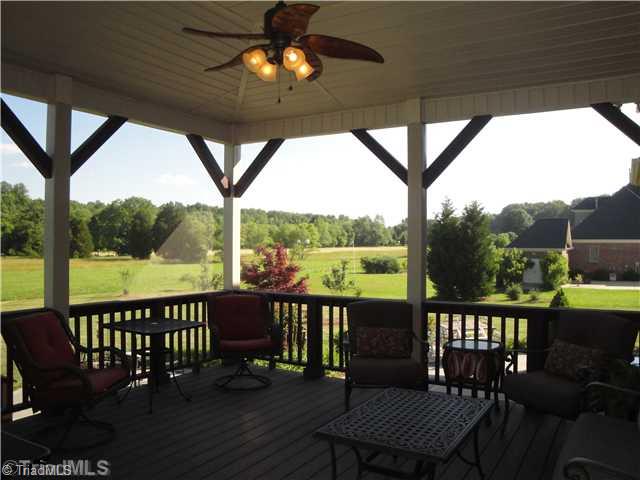 5810 Crutchfield Farm Road Oak Ridge, NC 27310 - Photo 5 of 16 Screened Porch. This unbelievably serene screened porch will be the envy of your neighbors! It overlooks the large backyard and field behind.
