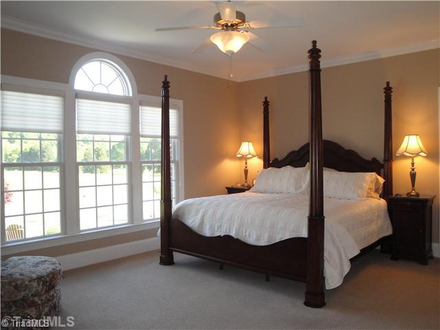 5810 Crutchfield Farm Road Oak Ridge, NC 27310 - Photo 6 of 16 Master Bedroom. This luxurious master bedroom is spacious and serene! There is ample space to accommodate oversized furniture along with a sitting area!