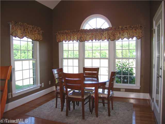 5810 Crutchfield Farm Road Oak Ridge, NC 27310 - Photo 7 of 16 Keeping Room. Located across from the breakfast area, the keeping room offers flexible space for endless possibilities! It features vaulted ceiling and is surrounded by windows.