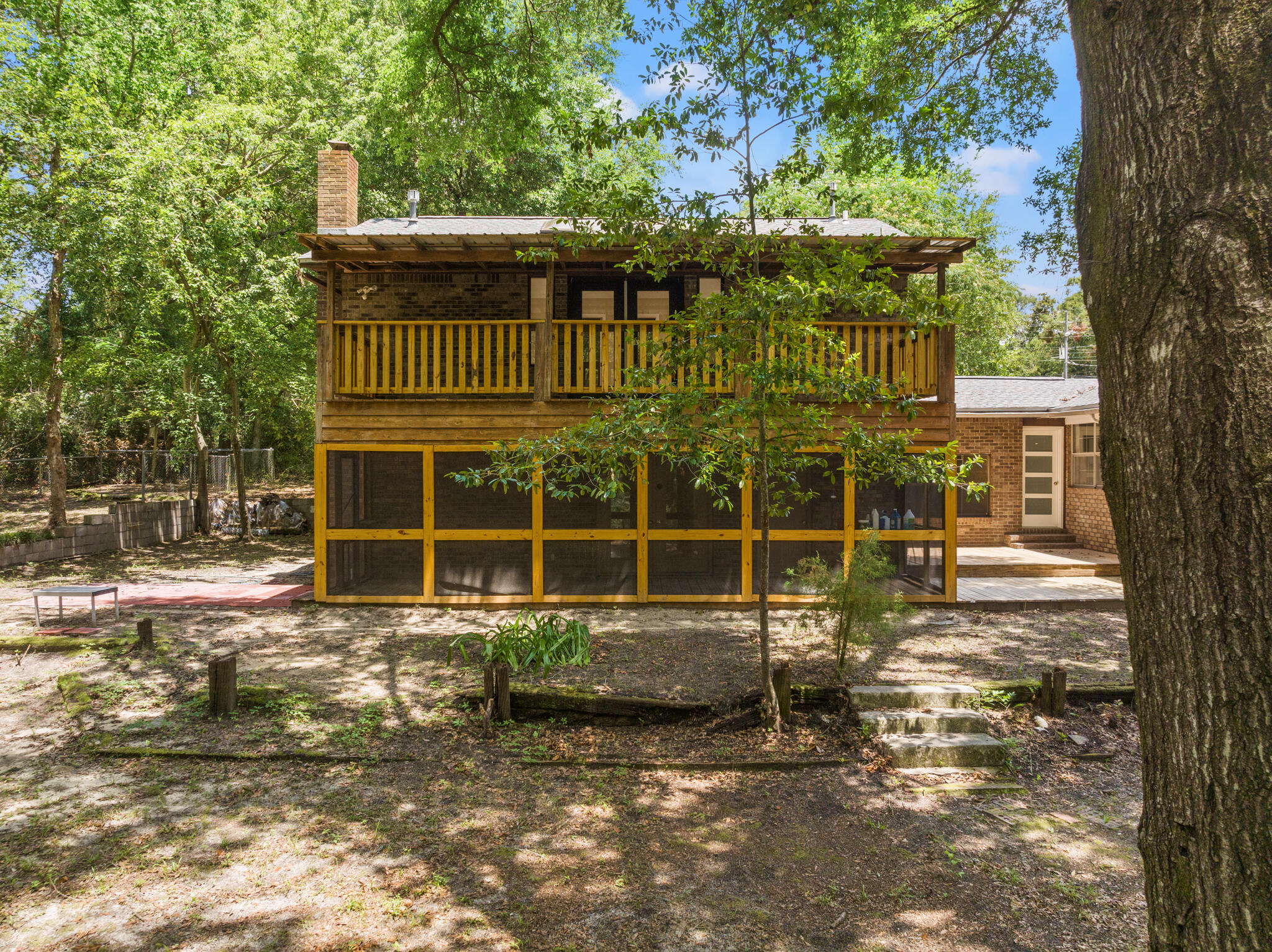 255 Brackin Street, Unit A&B Crestview, FL 32539 - Photo 28 of 70 a front view of a house with a yard
