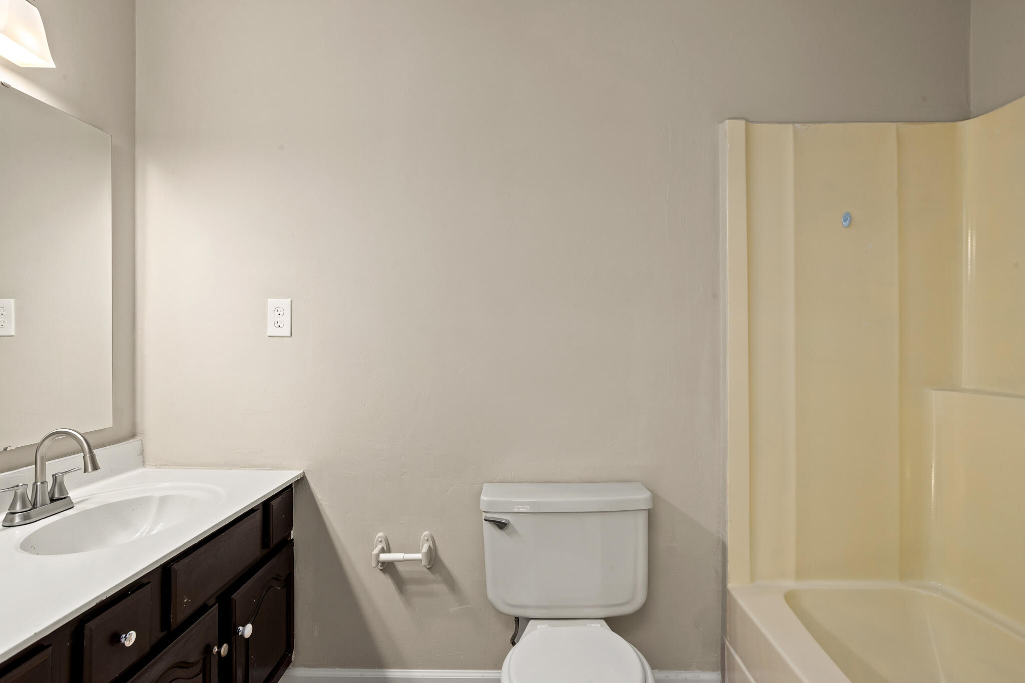 255 Brackin Street, Unit A&B Crestview, FL 32539 - Photo 48 of 70 a bathroom with a sink toilet vanity and tub